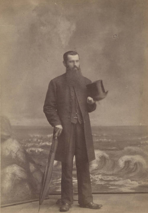 Standing Man, Painted Ocean Backdrop