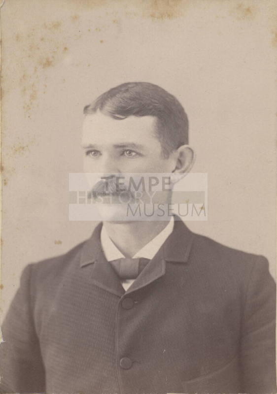 Shoulder, Man, Neck Tie and Dark Jacket