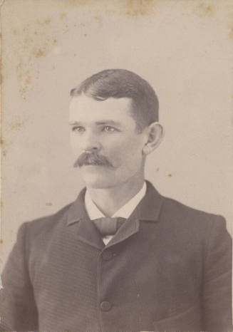 Shoulder, Man, Neck Tie and Dark Jacket