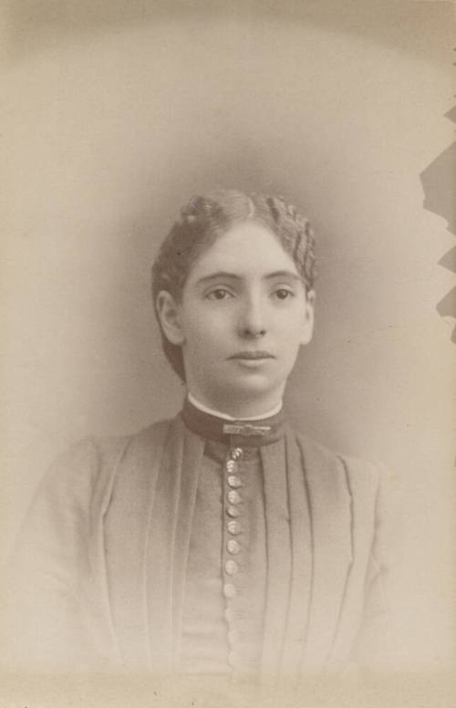 Bust, Woman, Pleaded Top and Neck Pin