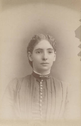 Bust, Woman, Pleaded Top and Neck Pin
