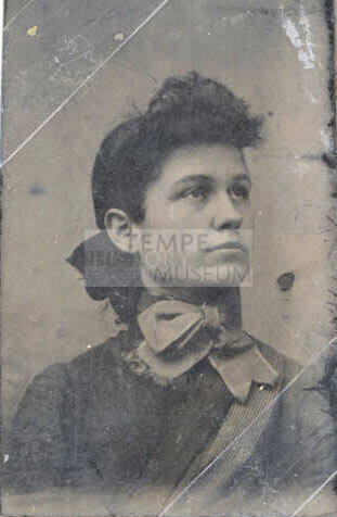 Portrait of Woman with Bow