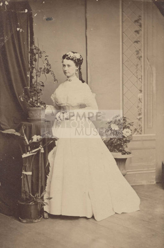 Standing Woman, White Dress and Corset