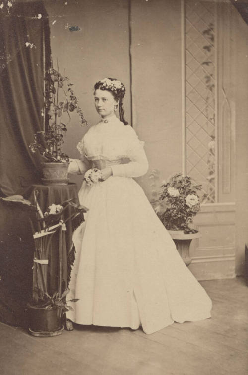 Standing Woman, White Dress and Corset