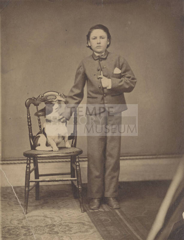 Standing Child with hand on Dog