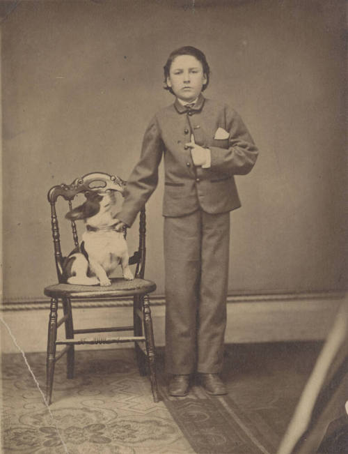 Standing Child with hand on Dog