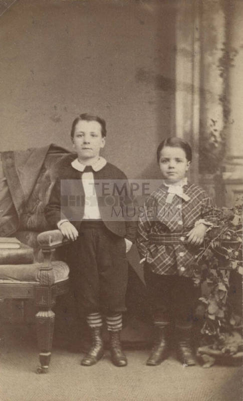 Standing Children in School Uniforms