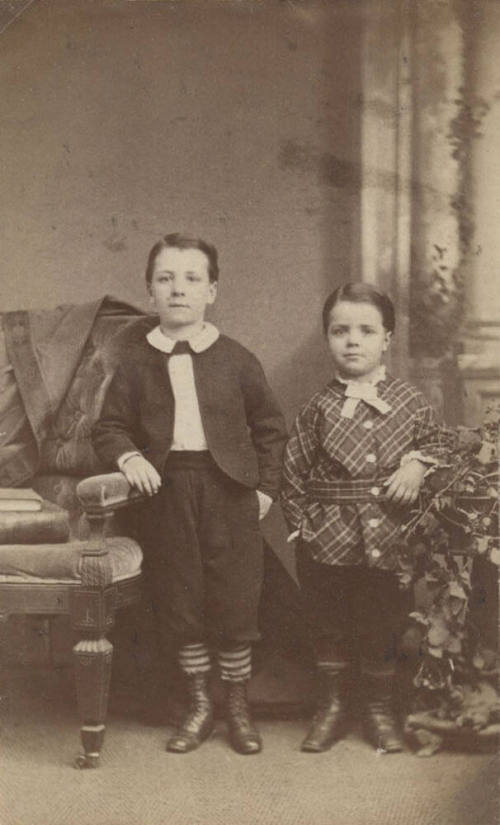 Standing Children in School Uniforms