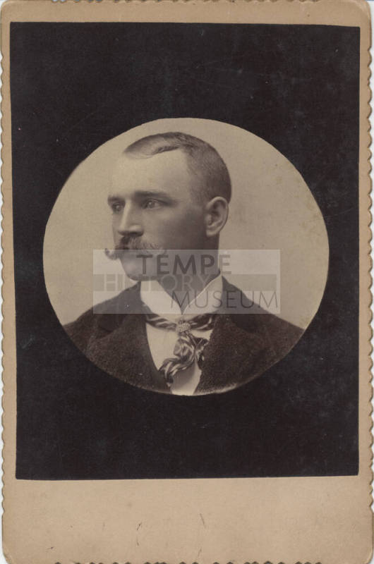 Shoulder, Man, Neck Tie and Dark Jacket