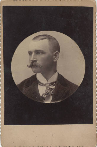 Shoulder, Man, Neck Tie and Dark Jacket