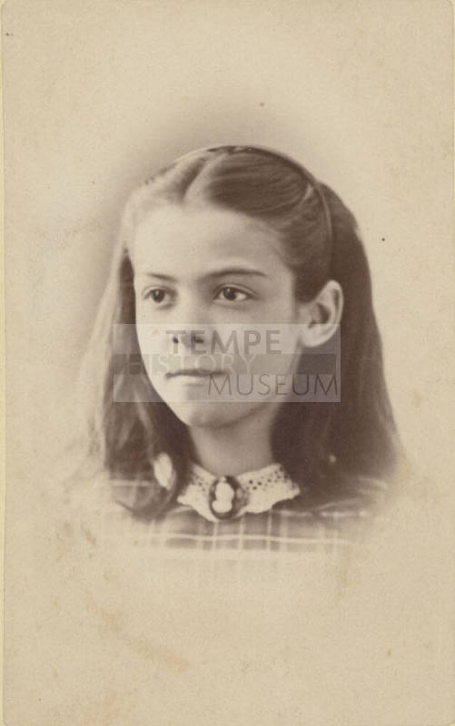 Portrait of Young Girl Wearing a Lace Collar and Brooch