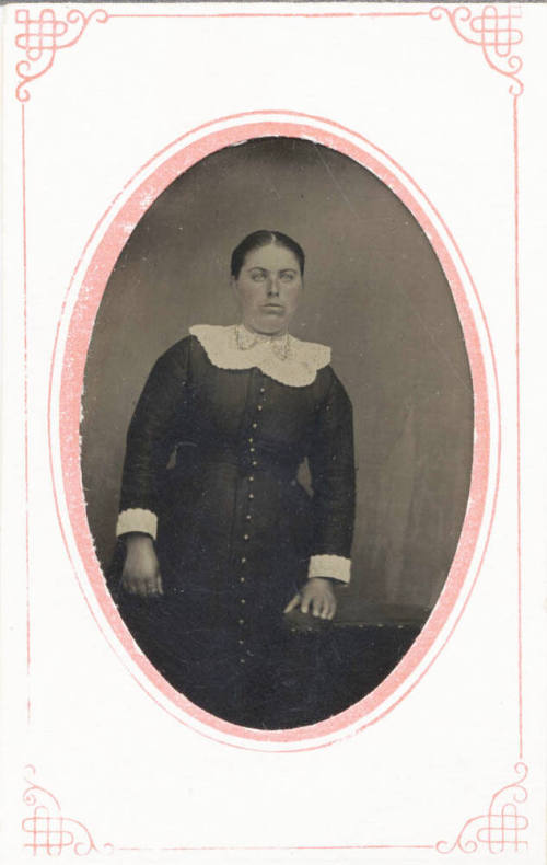 Standing Woman, Dark Dress and Lace Collar