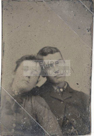 Couple Leaning Their Heads Together