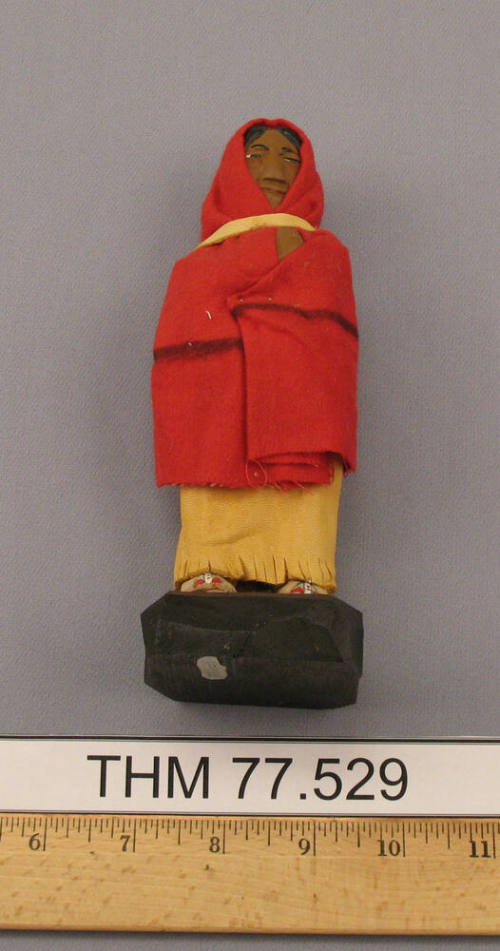 Doll, Taos