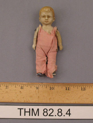 Boy doll with pink cotton jump suit