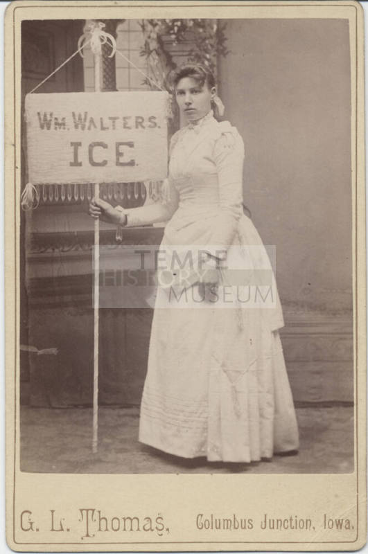 Woman Holding a Wm. Walter's Ice Sign