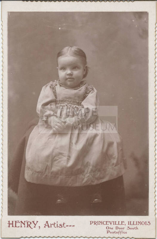 Sitting Child with Plain Clothing On