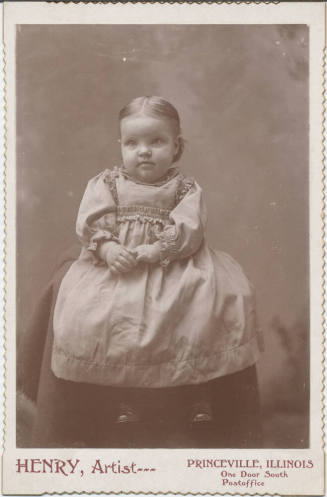 Sitting Child with Plain Clothing On