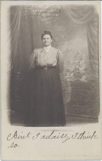 Standing Woman in Front of a Wall