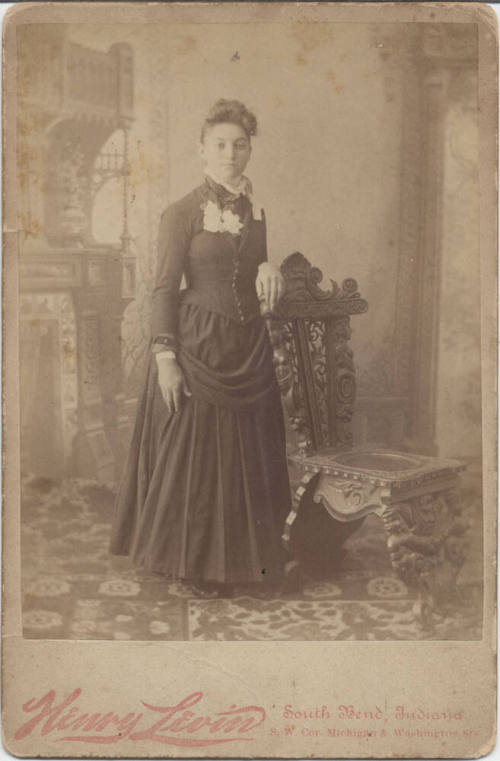 Standing Woman, Floral Brooch