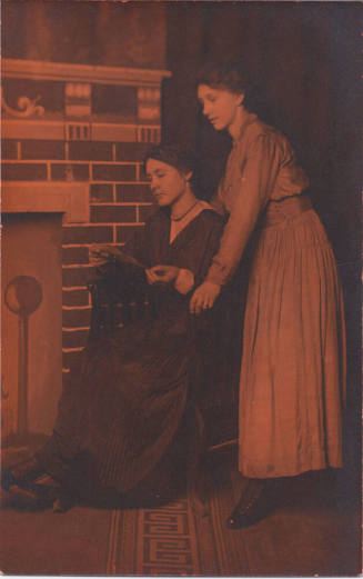 Two Women Reading a Letter