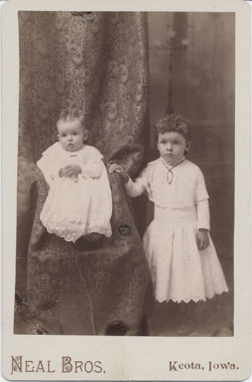 Full Length Portrait of Baby and Girl