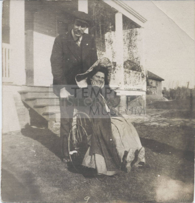 Woman in Wheelchair and Man