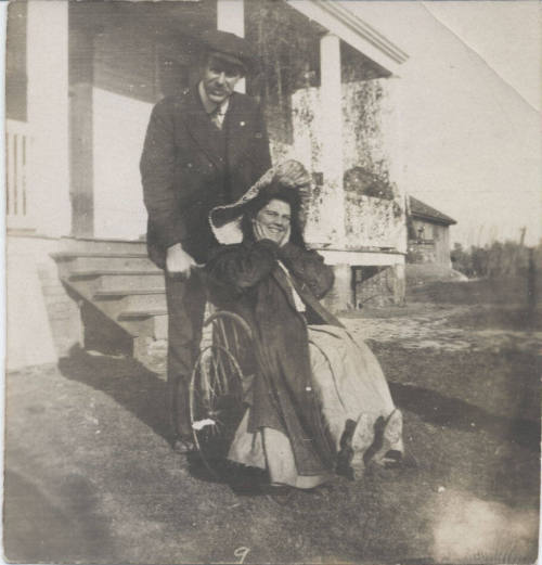 Woman in Wheelchair and Man