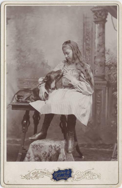 Full Length Portrait of Seated Girl