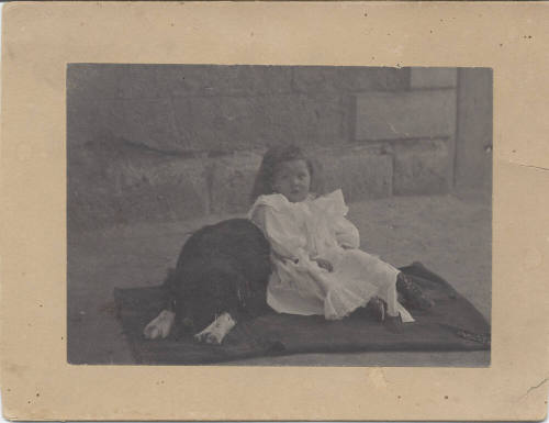 Full Length Picture of Seated Girl