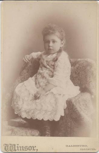Full Length Portrait of Seated Girl