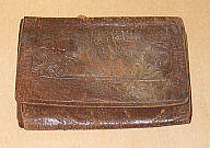 Engraved leather trifold wallet