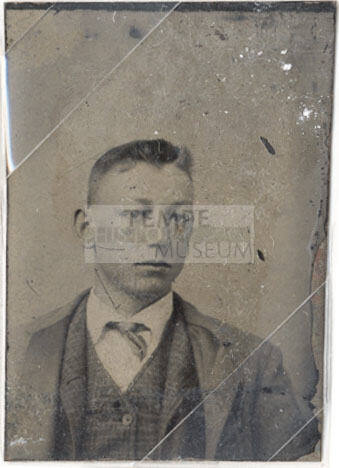 Portrait of Man in Checkered Suit