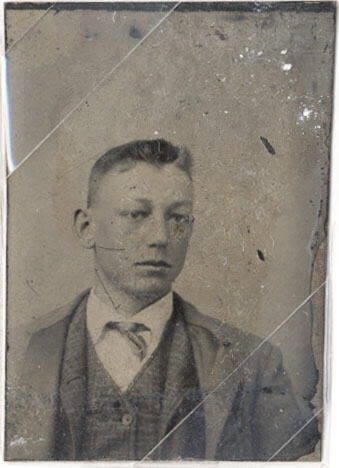 Portrait of Man in Checkered Suit