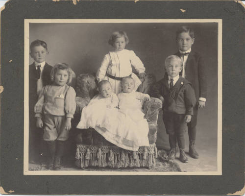 Portrait of Children Seated and Standing
