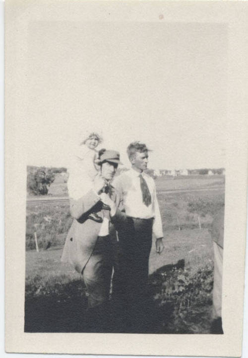 Portrait of Two Men and Baby