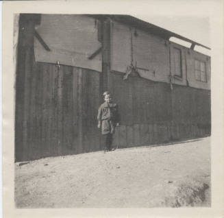 Portrait of Boy in Front of Building