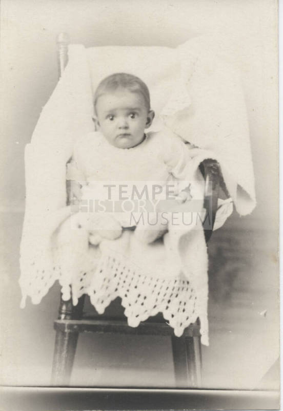 Portrait of Baby in High Chair