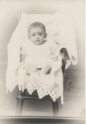 Portrait of Baby in High Chair