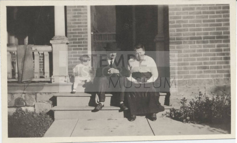 Family Picture in Front of Home