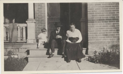Family Picture in Front of Home