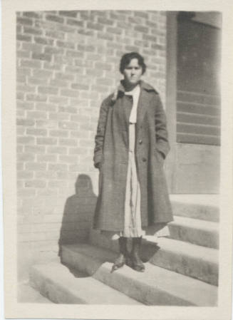 Portrait of Young Woman Outside Building