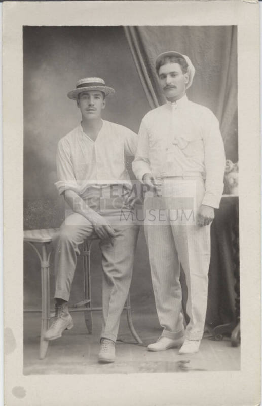 Full Length Portrait of 2 Men