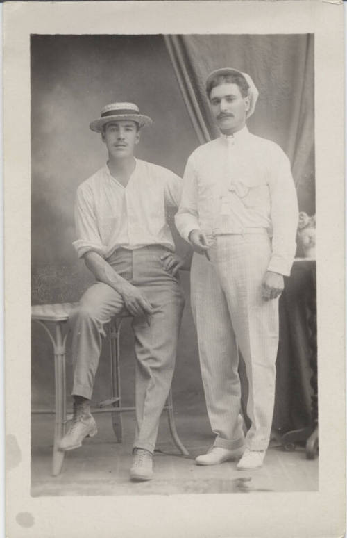 Full Length Portrait of 2 Men