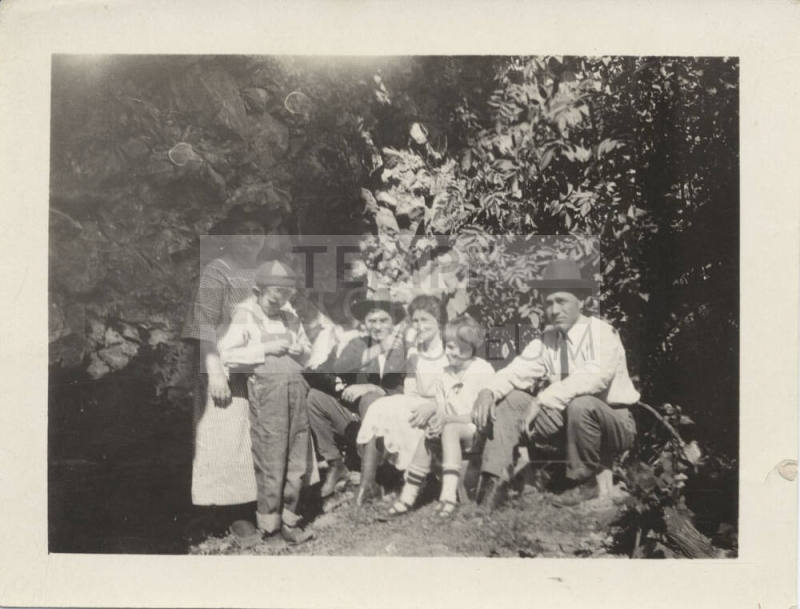 A Family Portrait in a Forest Setting