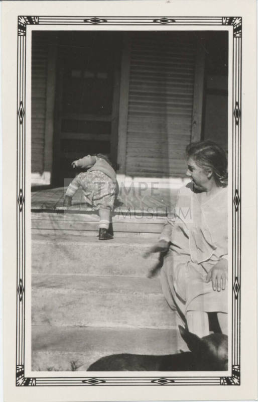 Young Child Trying to Climb Stairs