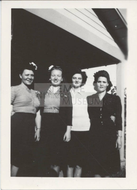 Four Ladies Standing Together