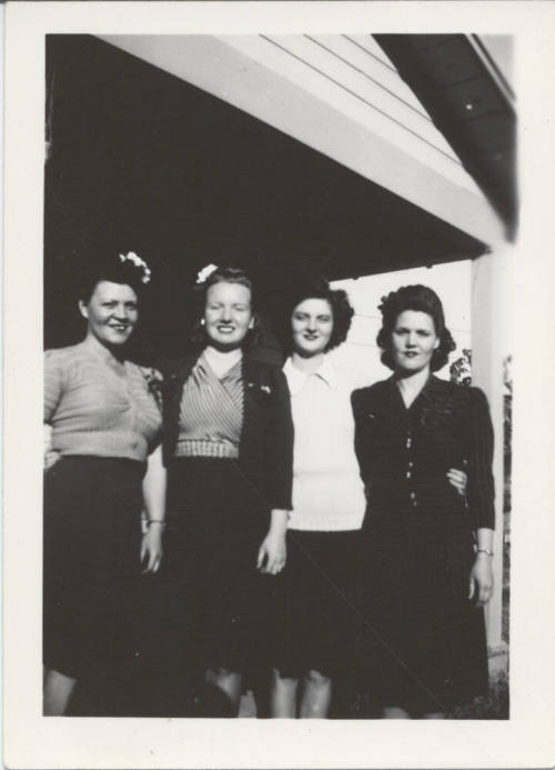 Four Ladies Standing Together