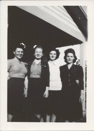 Four Ladies Standing Together