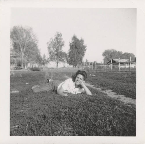 A Lady Laying on the Grass